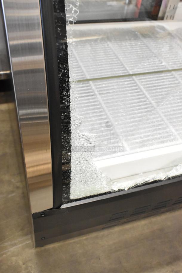 Brand new Avantco 178DLC82HCB 82" black deli case with broken curved glass; 115V, 1 phase, scratch and dent condition.