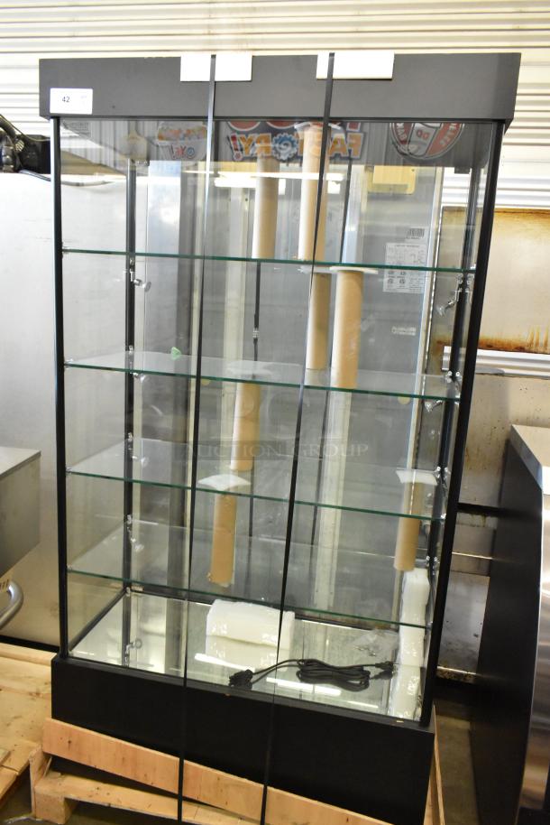 BRAND NEW scratch and dent dry shelving unit display case with glass shelves and black frame. Minor cosmetic blemishes.