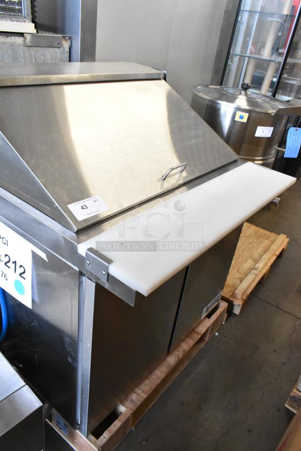 Brand new 2023 Avantco 178APT36MHC sandwich salad prep table, stainless finish, slight dents, 115V, 1 phase, with ID labels.