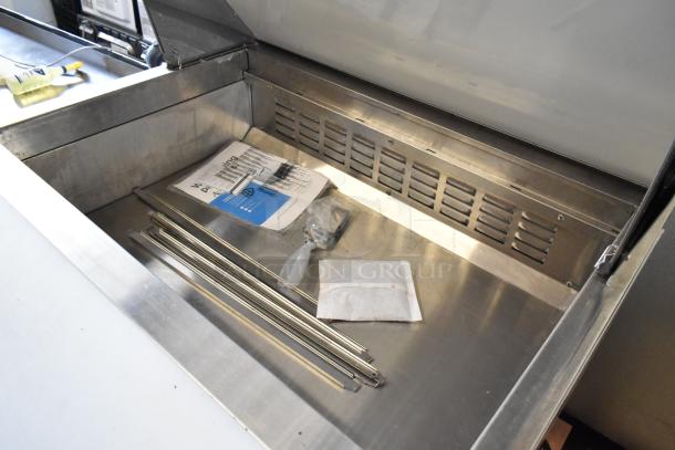 Brand new Avantco 178APT36MHC Sandwich Prep Table, scratch and dent condition, includes assembly parts and manual.