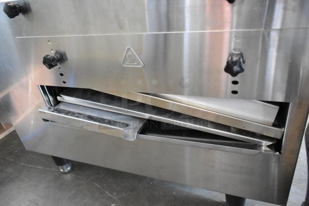 Stainless steel Cooking Performance Group 351ICOEB countertop electric conveyor pizza oven, brand new scratch and dent, missing belt.
