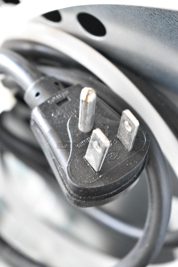 Close-up of a power plug for the 2023 Scotsman CU0415MA-1A Stainless Steel Ice Machine, 115 Volts, 1 Phase.