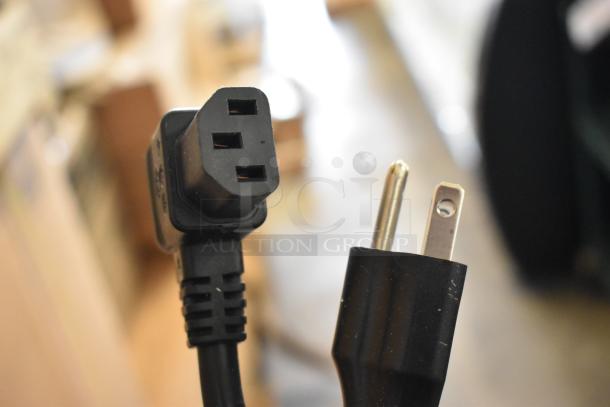 Close-up of a power plug compatible with the Narvon 23BCWD8HT countertop water dispenser.