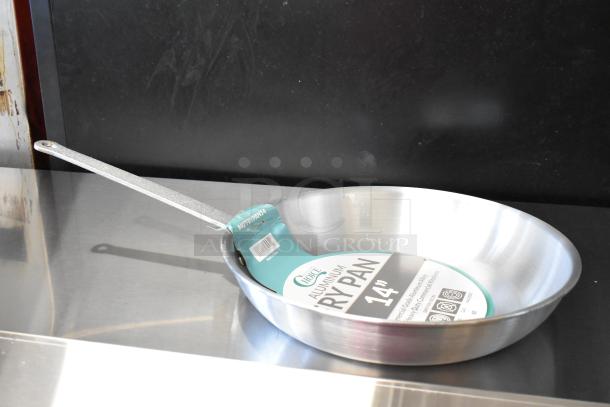 14" Choice aluminum fry pan, brand new with label, scratch and dent condition, long riveted handle for durability.