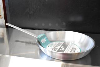 14" Choice aluminum fry pan, brand new with label, scratch and dent condition, long riveted handle for durability.