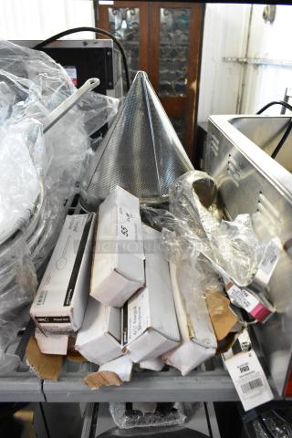 12 new kitchen items including Acopa Phoenix Gold 6.5" teaspoons in boxes, china cap strainer, ladles. Multiples per bid.