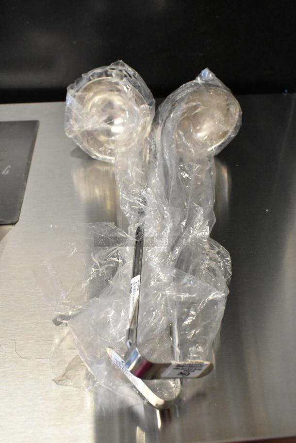 12 brand new scratch and dent items, including Acopa Phoenix Gold teaspoons, China cap strainer, and ladles. Wrapped in plastic.