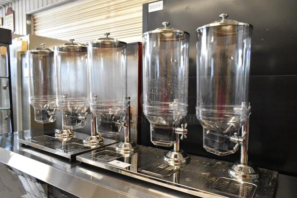 Brand new metal and poly dry dispensers; one double, one triple. Dimensions 33x14x26 and 21.5x14x26. Ideal for cereals or dry goods.
