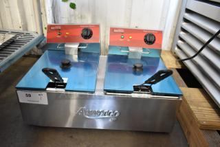 Brand new Avantco 177F102 stainless steel 20 lb. dual tank electric fryer with two metal baskets and lids. 120V, 1 Phase.