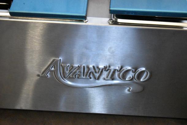 Brand new Avantco 177F102 dual tank electric fryer, 20 lb capacity, stainless steel, with logo, includes baskets and lids.