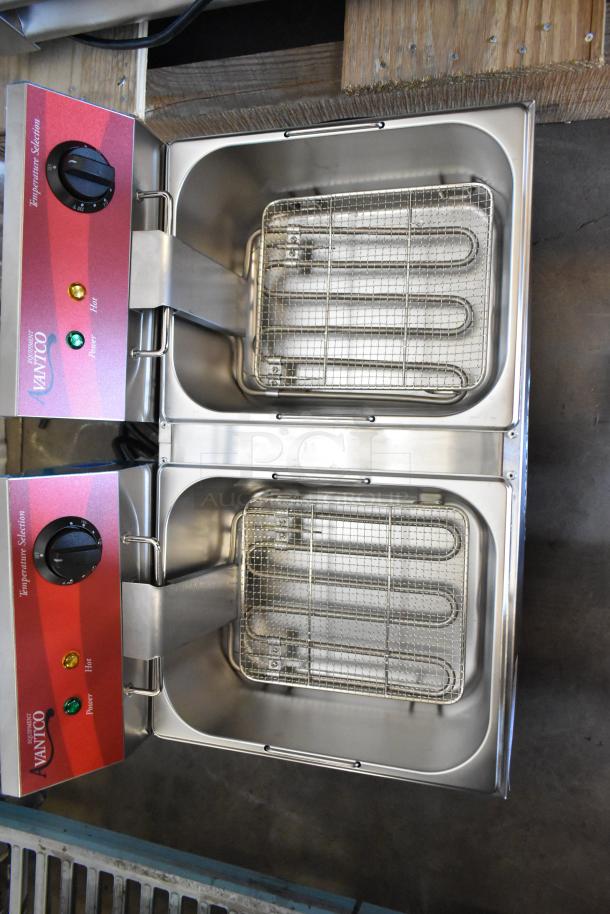 Brand new 2025 Avantco 177F102 stainless steel dual tank electric fryer with 2 metal baskets and lids, 120V, 1 Phase.
