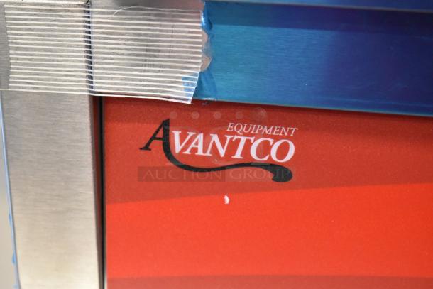 Brand new Avantco 177PG200GS Panini Grill with grooved top, smooth bottom plates, 13 3/8" x 8 3/4" surface.