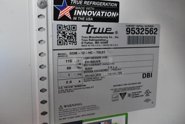 2018 True GDM-12-HC metal commercial cooler tag, shows model, 115V, refrigerant R290, compressor EMI50UER.
