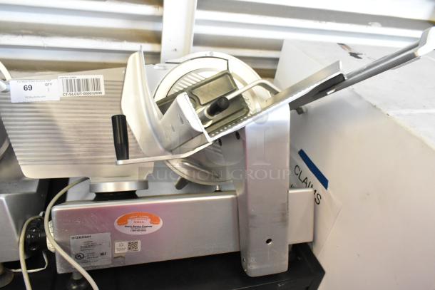 Bizerba stainless steel commercial meat slicer, 115 volts, 1 phase, with visible labels and controls, in used condition.