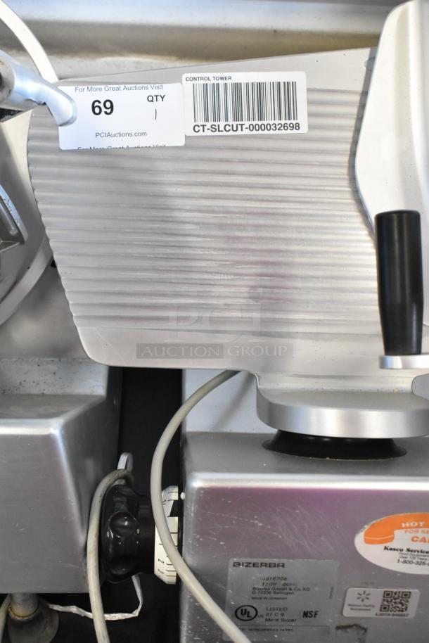 Bizerba stainless steel commercial meat slicer, 115 volts, 1 phase. Control dials and barcode tag visible.