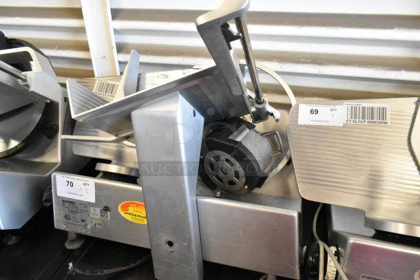 Bizerba SE 12 US stainless steel meat slicer, 115V, 1 phase, commercial countertop model, visible wear, auction label.