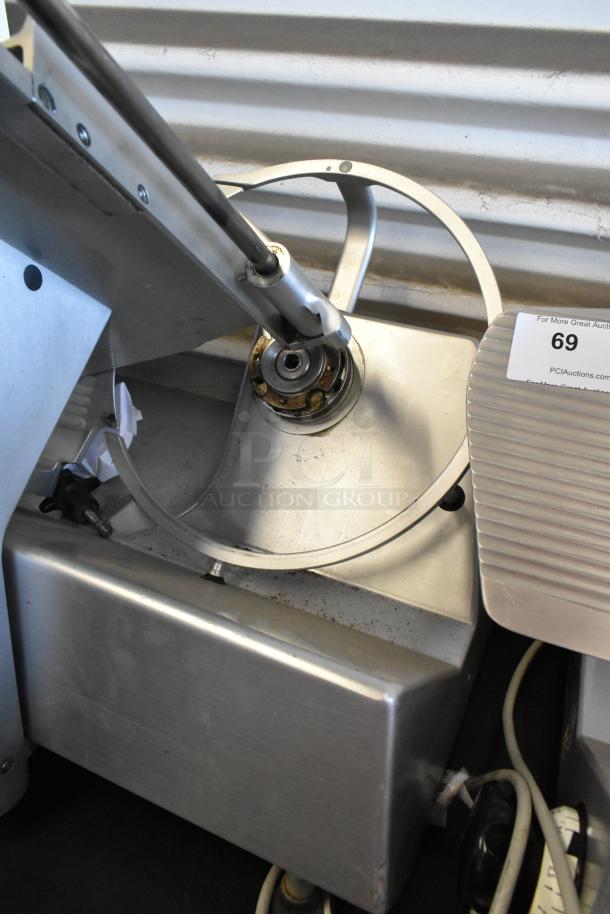 Bizerba SE 12 US stainless steel countertop meat slicer. Used condition, 115 volts, 1 phase. Model SE 12 US visible.