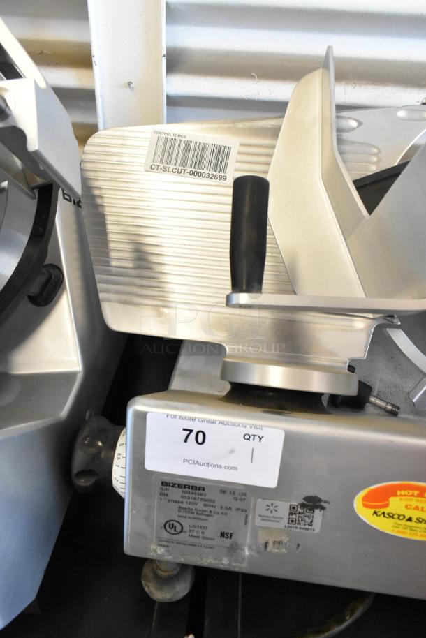 Bizerba SE 12 US stainless steel commercial meat slicer, 115V, 1 phase. Features visible labels and control knob.