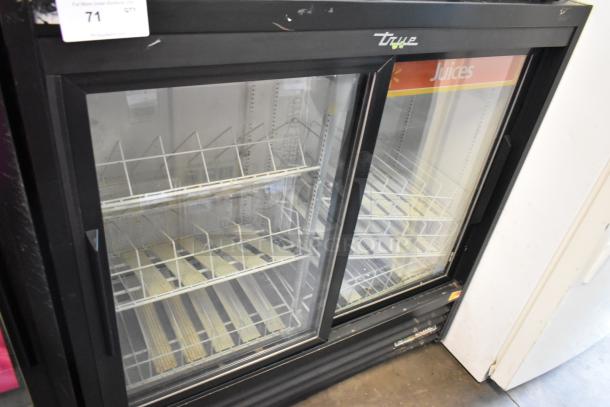2018 True GDM-41SL-48-HC-LD metal commercial 2-door cooler, poly-coated racks, 115 volts, slight wear, juice label.