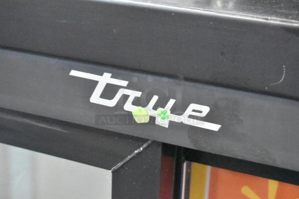 2018 True GDM-41SL-48-HC-LD commercial cooler with logo detail. Two-door, poly-coated racks. 115V, 1-phase.