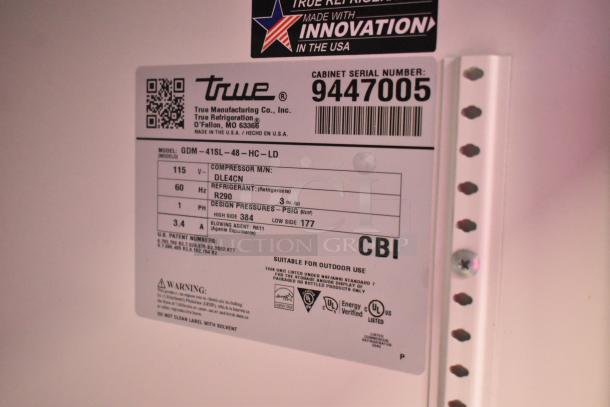 2018 True GDM-41SL-48-HC-LD commercial cooler label, 115V, 1 phase, R290 refrigerant, serial 9447005, suitable for outdoor use.