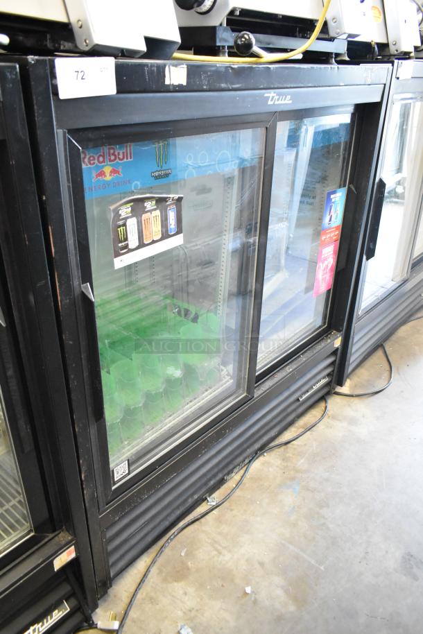2018 True GDM-41SL-48-HC-LD metal 2-door reach-in cooler, poly-coated racks, 115V, 1 phase, visible branding, good condition.