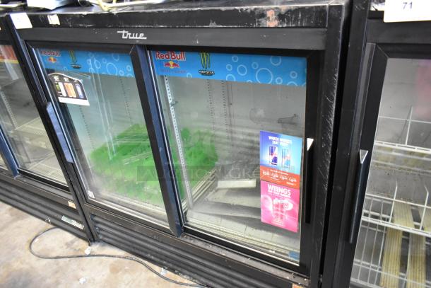 2018 True GDM-41SL-48-HC-LD commercial cooler with two glass doors and poly-coated racks, 115V, 1 phase. Visible product decals.