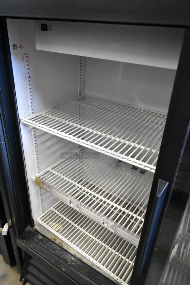 2017 True GDM-41SL-48-HC-LD 2 Door Cooler, poly coated racks, metal frame, 115 volts, used condition, interior view.