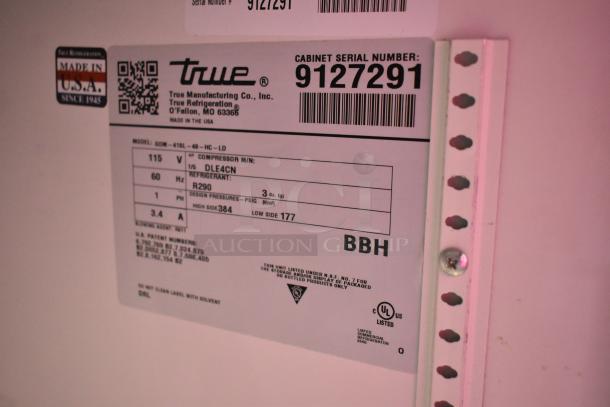 Label on 2017 True GDM-41SL-48-HC-LD 2 Door Reach-In Cooler, showing model, voltage, refrigerant, and serial number.