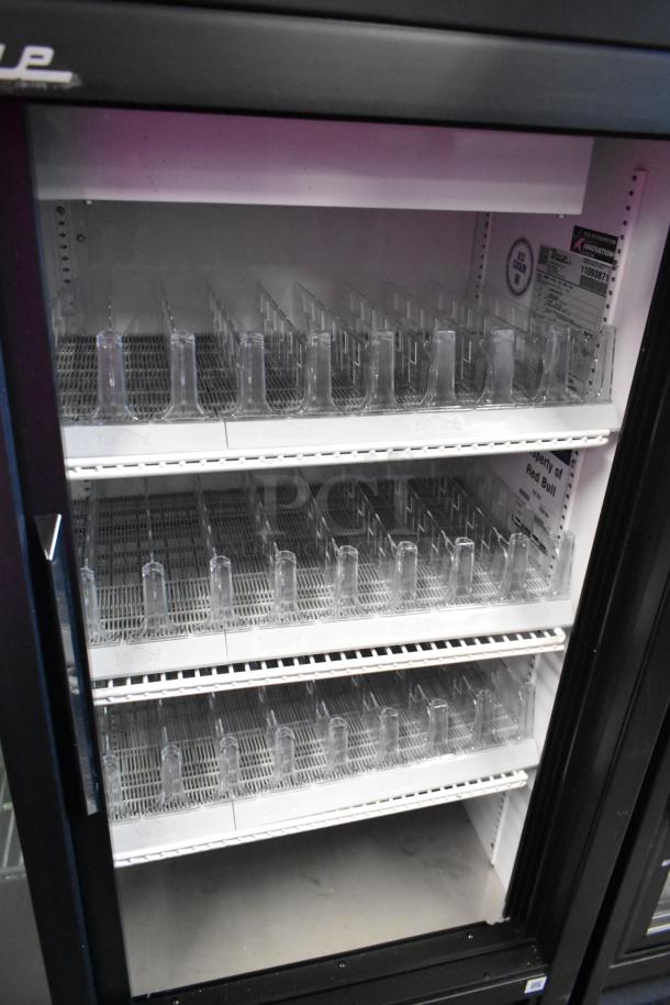 True GDM-41SL-54-HC-LD commercial cooler, 2 glass doors, poly coated racks, 115V, 1 phase, excellent condition.