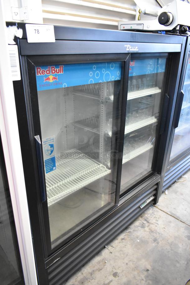 True GDM-41SL-54-HC-LD cooler with two glass sliding doors, poly coated racks, 115 volts, commercial use.