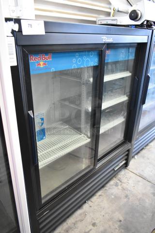 True GDM-41SL-54-HC-LD cooler with two glass sliding doors, poly coated racks, 115 volts, commercial use.