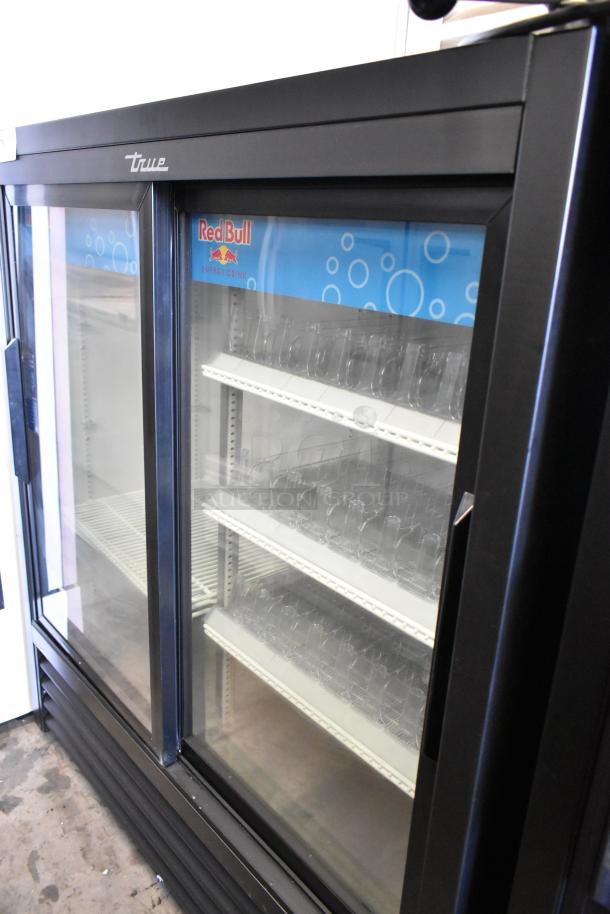 True GDM-41SL-54-HC-LD 2-door cooler merchandiser with poly-coated racks, excellent condition, 115V, 1 Phase.