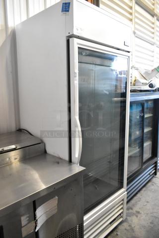 2021 True TSCI-600R-G-PH reach-in cooler with glass door, poly-coated racks, 115V, 1 phase, excellent condition.
