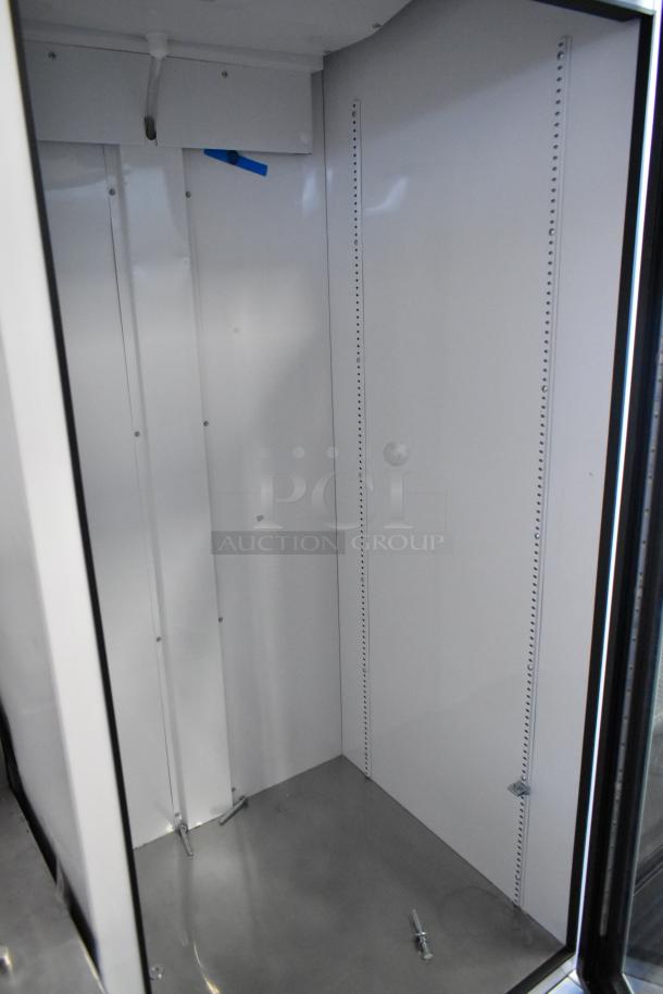 2021 True TSCI-600R-G-PH commercial cooler interior, metal body, poly coated racks, in excellent condition, single door.