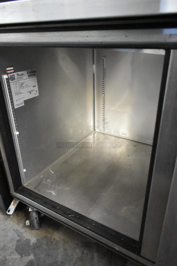 2017 True TPP-67 stainless steel pizza prep table, commercial casters, 115V, 1 Phase, label indicates model and specs.