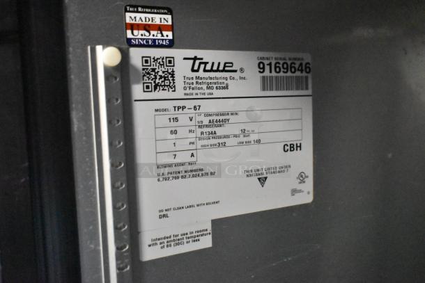 2017 True TPP-67 stainless steel pizza prep table label, 115 volts, 1 phase, commercial casters, made in USA.