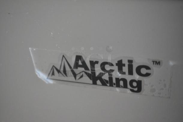 Arctic King ARC070S0aRWW metal chest freezer with hinge lid, visible brand logo, 115 volts, 1 phase.