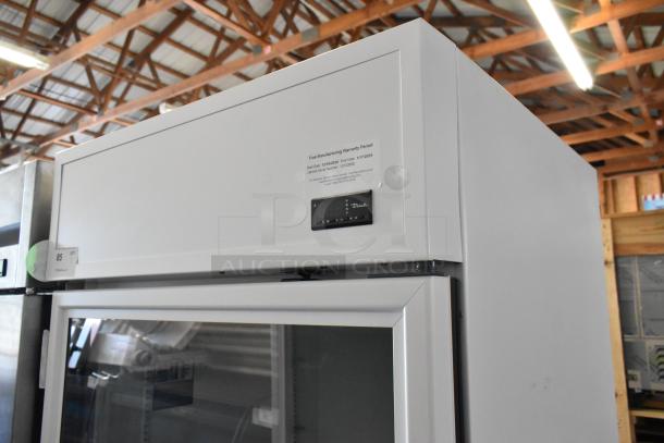 2021 True TSCI-600R-G-PH Metal Single Door Reach-In Cooler, glass front, with poly-coated racks, 115 volts, 1 phase.