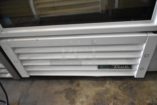 2021 True TSCI-600R-G-PH Single Door Cooler, metal finish, poly coated racks, visible True logo, 115V, 1 phase.