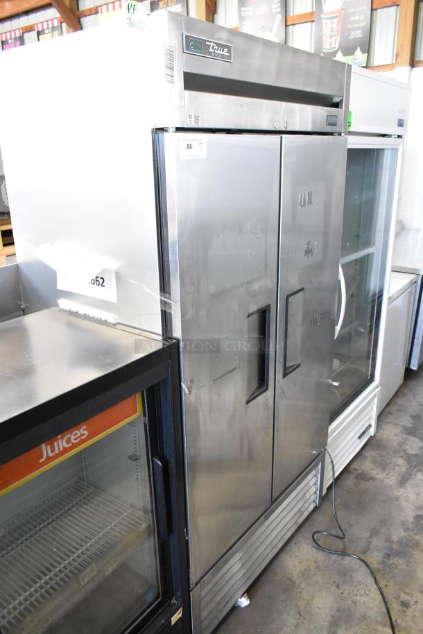 2017 True T-35-HC stainless steel commercial reach-in cooler with two doors and poly-coated racks, 115 volts, 1 phase.