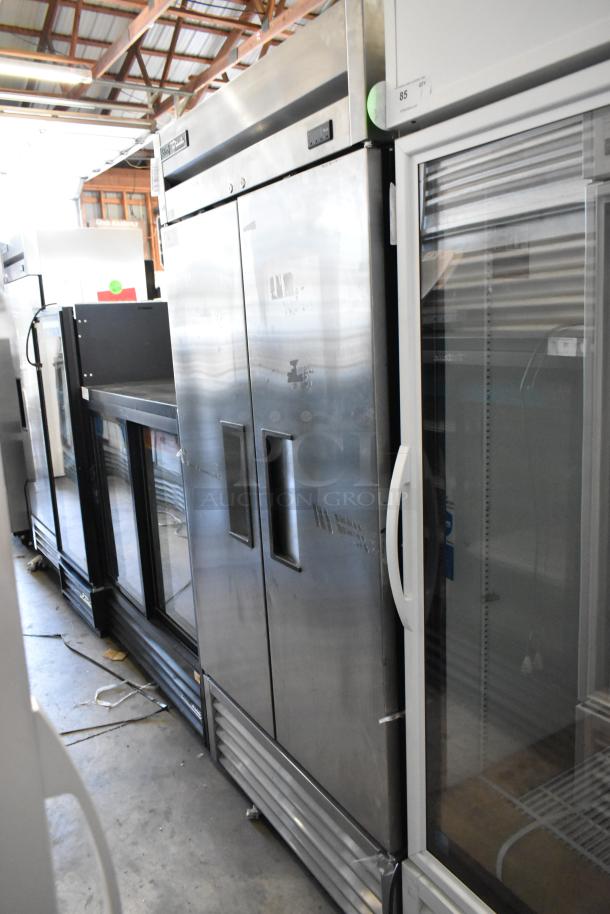 2017 True T-35-HC stainless steel commercial 2-door reach-in cooler with poly-coated racks, 115 volts, 1 phase.