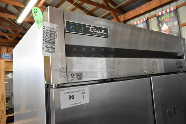 2017 True T-35-HC stainless steel commercial cooler, 2 doors, Polly coated racks, 115V, 1 phase, with labels and markings.