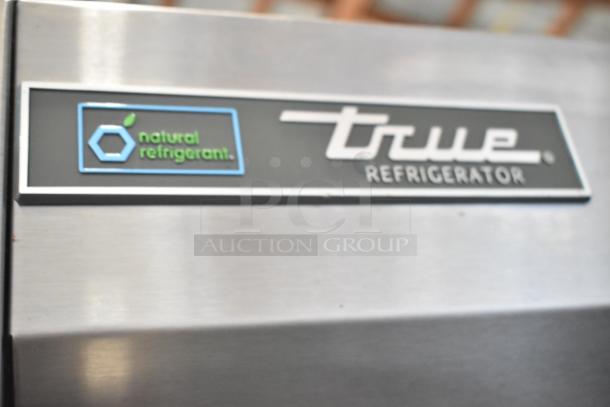 2017 True T-35-HC stainless steel 2-door reach-in cooler, tag shows "natural refrigerant". Poly-coated racks, 115V, 1-phase.