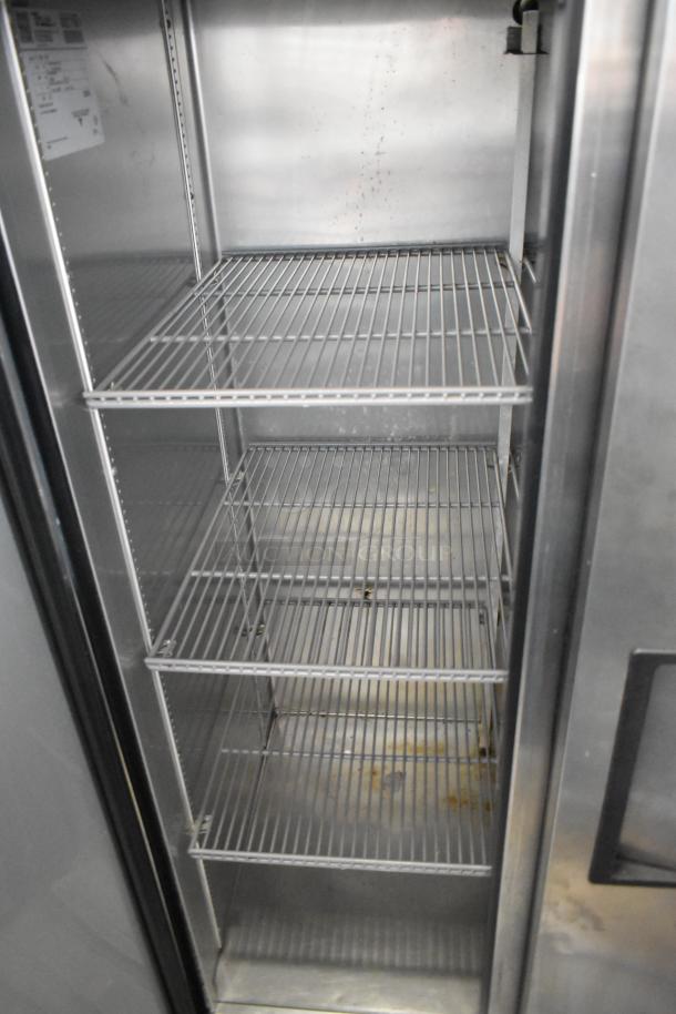 2017 True T-35-HC stainless steel commercial cooler, 2 doors, polly coated racks, 115 volts, 1 phase, interior view.