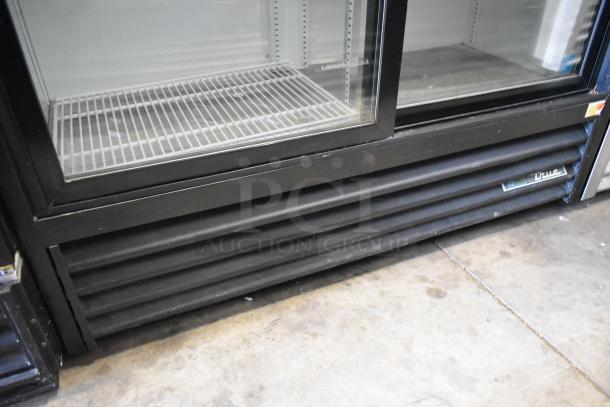2018 True GDM-41SL-48-HC-LD metal 2-door reach-in cooler, poly-coated racks, 115 volts, 1 phase, good condition.