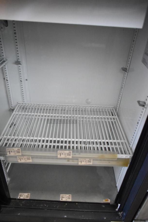 2018 True GDM-41SL-48-HC-LD commercial cooler, 2-door, poly-coated racks, metal finish, 115V, 1 phase, clean interior.