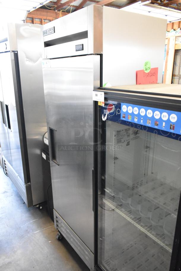 2021 True T-19F-HC stainless steel commercial freezer on casters, single door, poly coated racks, 115V, 1 Phase.