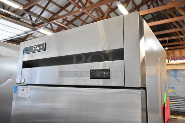 2021 True T-19F-HC stainless steel commercial single door reach-in freezer, digital display, on casters, 115V, 1 phase.