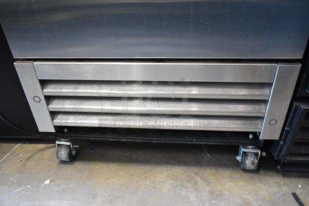 2021 True T-19F-HC stainless steel commercial freezer with poly-coated racks, on casters. Single door, 115V, 1 phase.